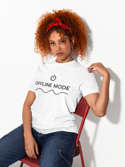 Woman wearing a white t-shirt with 'OFFLINE MODE' text, sitting on a red chair against a white background.