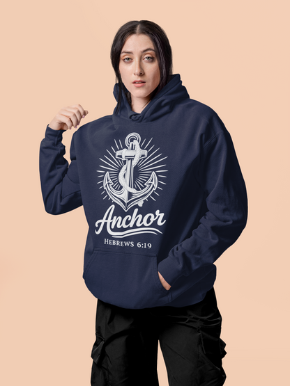 Person wearing a true navy blue hoodie with an anchor design and text on a beige background