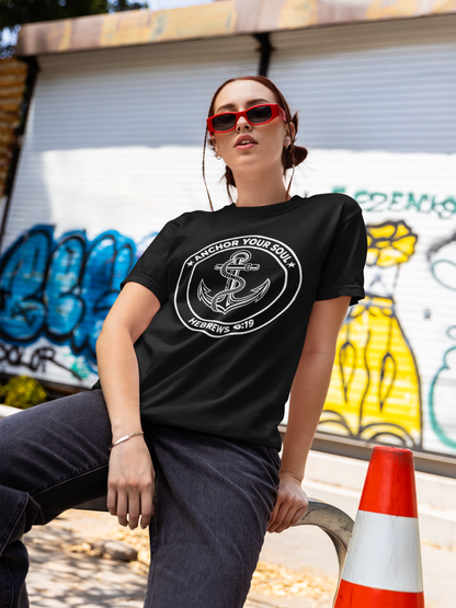 Person wearing a black t-shirt with 'Old Rules' graphic design in an urban setting with graffiti.