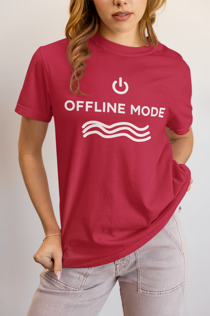 Person wearing a red t-shirt with 'OFFLINE MODE' text and power symbol.