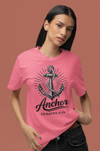 Person wearing a crunchberry (pinkish) t-shirt with an anchor design and text on a brown background