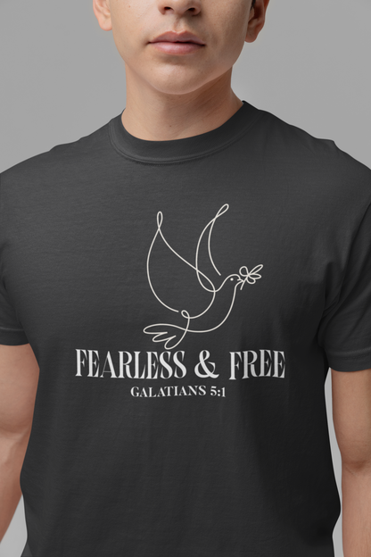 Person wearing a black t-shirt with a dove design and 'Fearless & Free Galatians 5:1' text.
