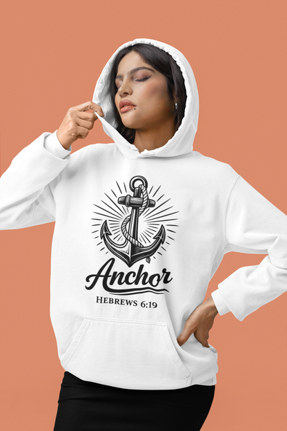 Person wearing a white hoodie with an anchor design and text on a peach background