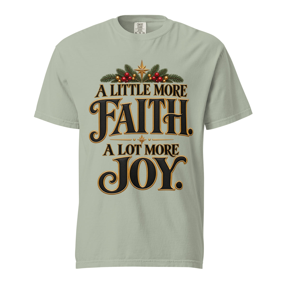 A Little More Faith, A Lot More Joy” Christmas tee with black-and-gold lettering, festive greenery, red berries, and gold stars.