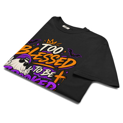 Too Blessed to Be Spooked garment-dyed tee in Black – folded flat lay – faith Halloween streetwear graphic tee by RavnCo.