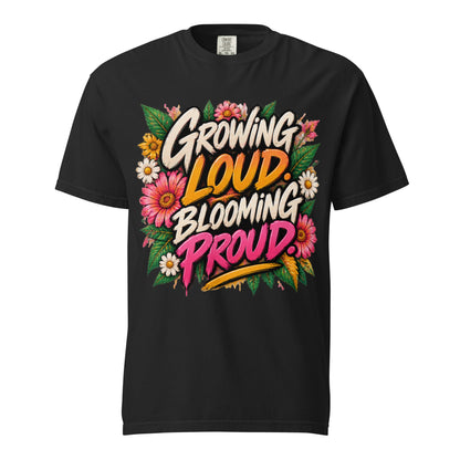 Black Growing Loud, Blooming Proud tee with cream, orange, and pink lettering surrounded by flowers and green leaves.