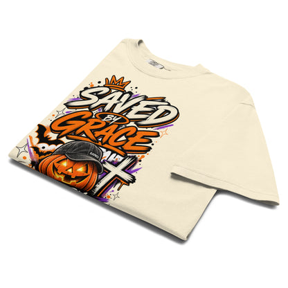 Saved by Grace, Not by Luck garment-dyed tee in Ivory – folded flat lay – faith Halloween streetwear graphic tee by RavnCo.