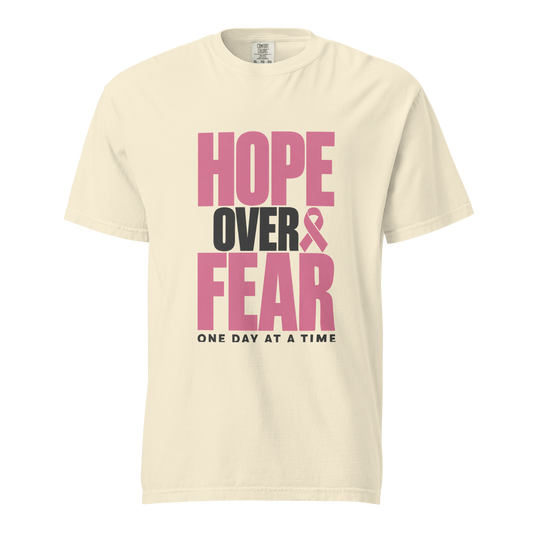Ivory tee with pink and black “Hope Over Fear” lettering, front view.