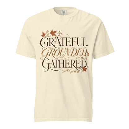 Ivory Comfort Colors tee with “Grateful. Grounded. Gathered.” lettering and autumn botanical accents on the front.