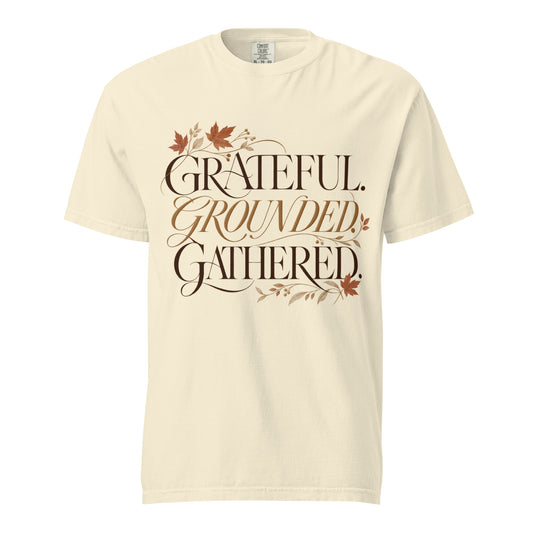 Ivory Comfort Colors tee with “Grateful. Grounded. Gathered.” lettering and autumn botanical accents on the front.