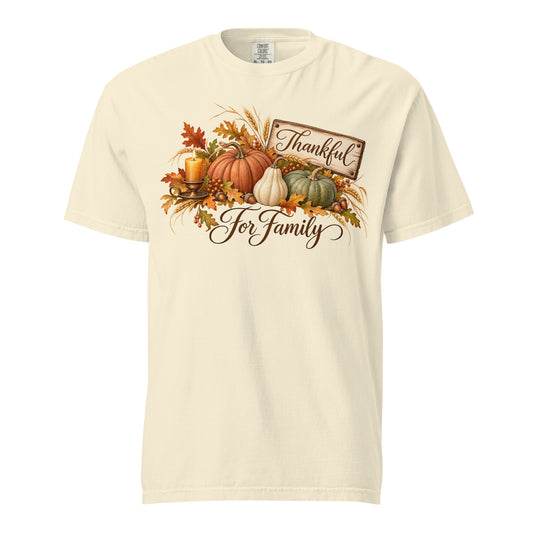 Ivory Comfort Colors tee featuring ‘Thankful Harvest for Family’ artwork with a rustic ‘Thankful’ sign, orange, cream, and green pumpkins, autumn leaves, wheat, a candle, and ‘For Family’ script.