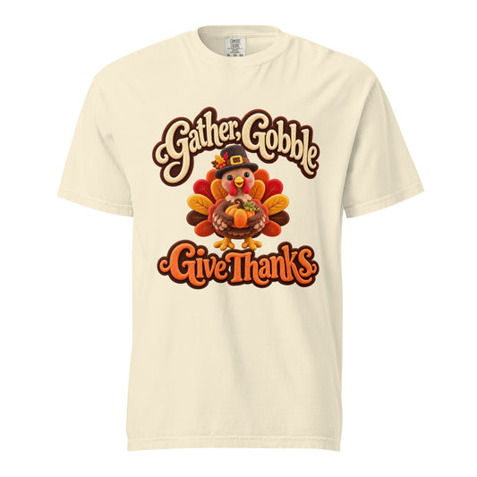 Ivory ‘Gather, Gobble, Give Thanks’ tee with cream and orange lettering and a colorful turkey holding a pumpkin.