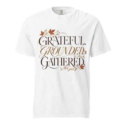 White Comfort Colors tee with “Grateful. Grounded. Gathered.” lettering and autumn botanical accents on the front.