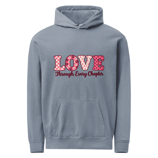 Blue Jean hoodie with patterned pink-and-ivory LOVE lettering and burgundy “Through Every Chapter” script on the front