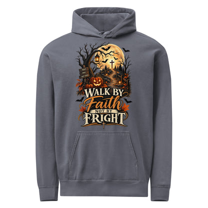 Denim hoodie with ‘Walk by Faith Not by Fright’ lettering, a golden moon, pumpkins, lanterns, and a cross along a woodland path.