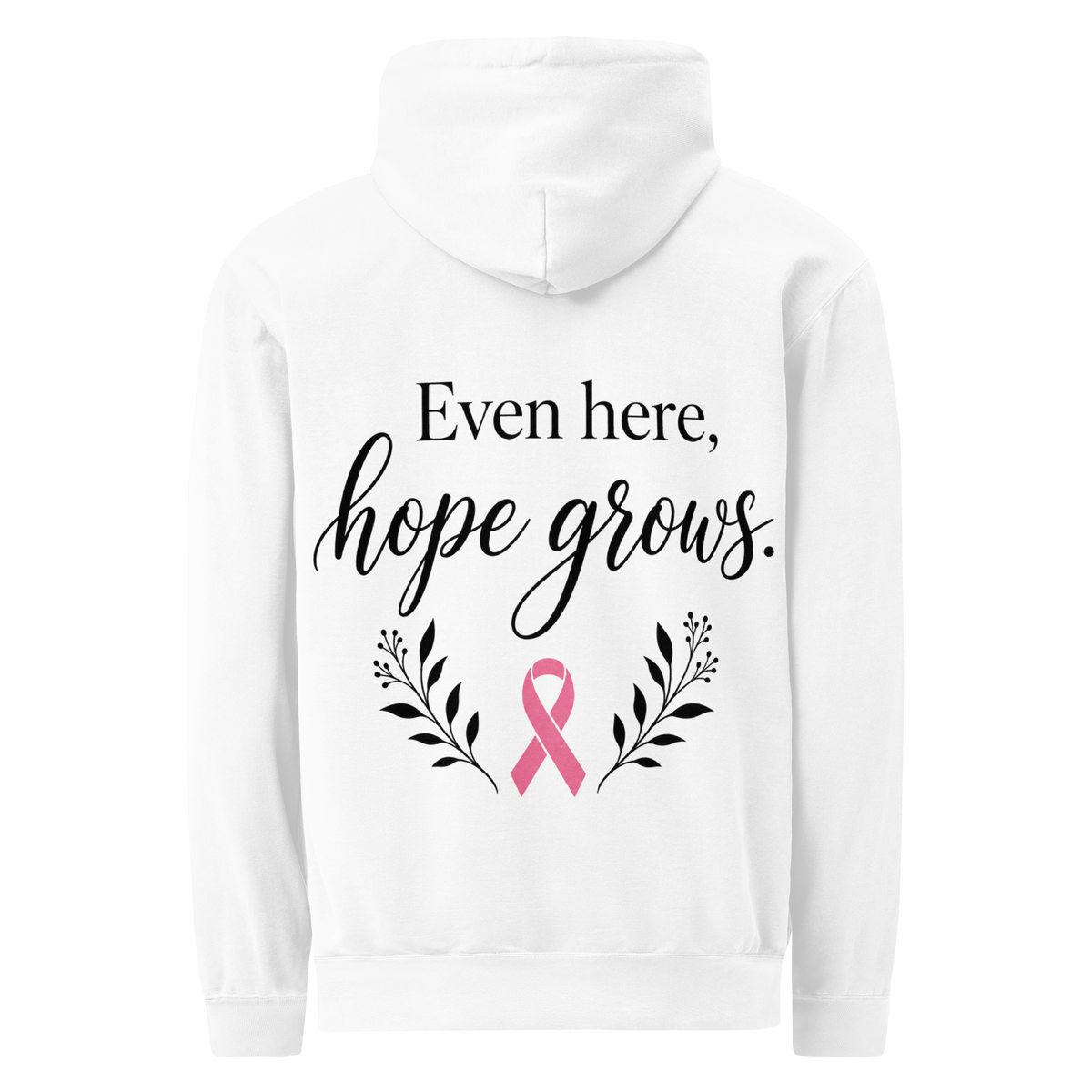 White hoodie back with black “Even here, hope grows.” lettering, a pink awareness ribbon, and botanical sprigs