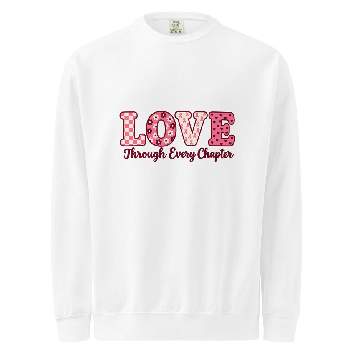 White sweatshirt with pink patterned LOVE lettering and burgundy “Through Every Chapter” script on the front.