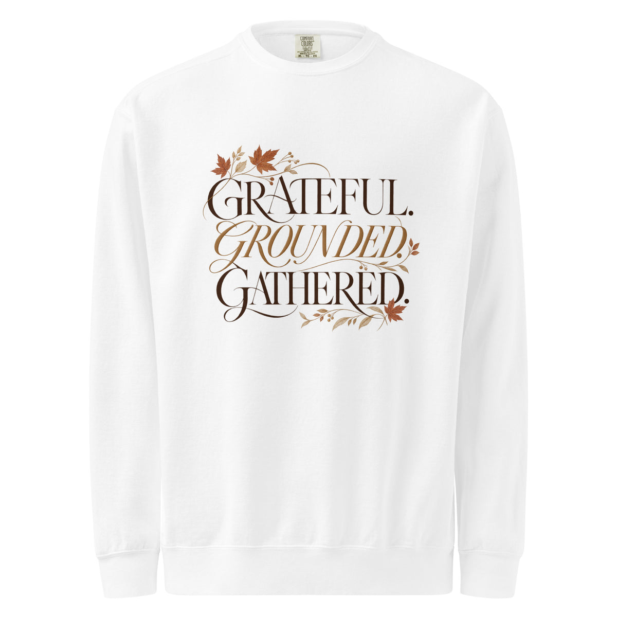 White ‘Grateful. Grounded. Gathered.’ sweatshirt with dark and muted gold lettering and autumn leaves.