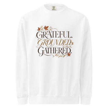 White ‘Grateful. Grounded. Gathered.’ sweatshirt with dark and muted gold lettering and autumn leaves.