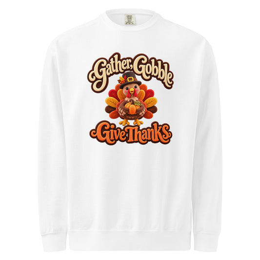 White Comfort Colors sweatshirt with a turkey holding a pumpkin and “Gather, Gobble, Give Thanks” lettering.