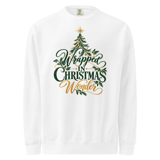 White Wrapped in Christmas Wonder sweatshirt with green lettering, a Christmas tree, and gold accents.