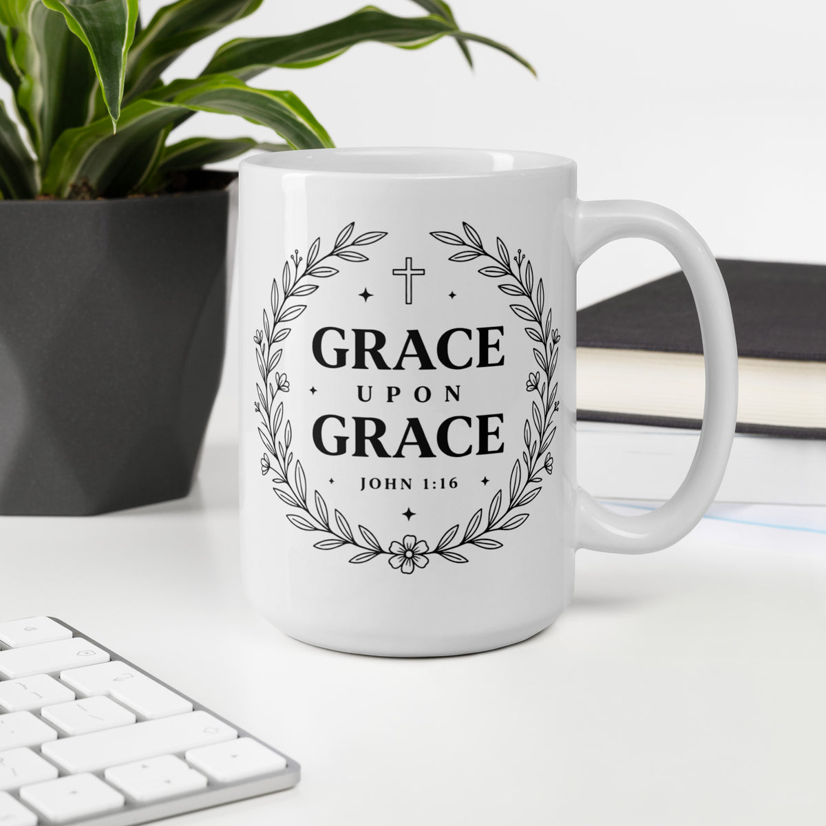 RavnCo Grace Upon Grace 15oz white glossy ceramic mug – John 1:16 fine-line design.